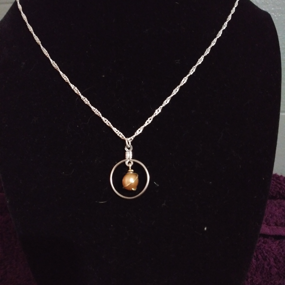 Beautiful gold shade pearl necklace and earrings